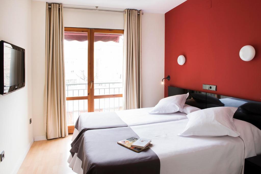 Hospedium Hostal Un Punto Chic Χουέσκα Δωμάτιο φωτογραφία