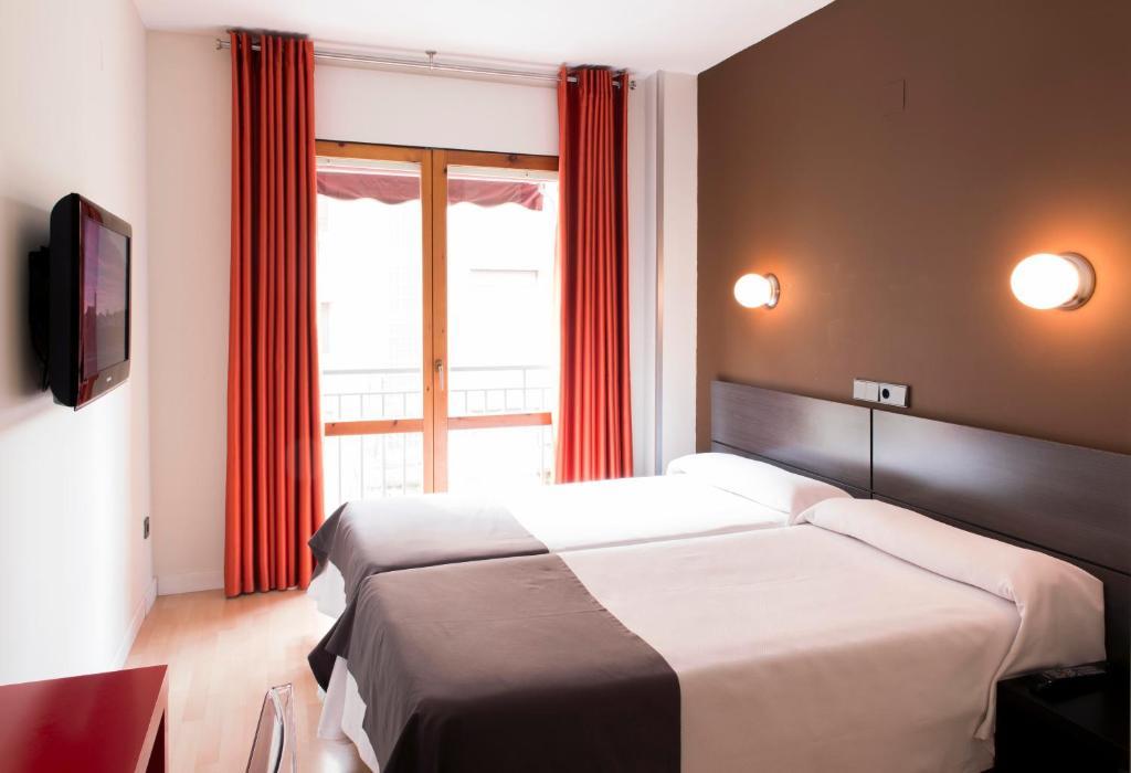 Hospedium Hostal Un Punto Chic Χουέσκα Δωμάτιο φωτογραφία